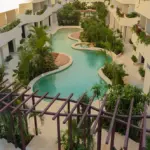 Elements 326 in Tulum , Quintan Roo, México. Development pre-sale by The Coral Properties. Main pool aerial view